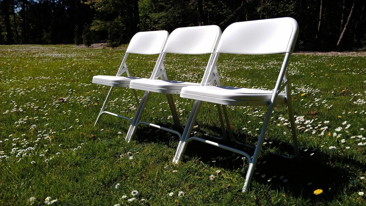 Three White Chairs in Ground, Available on Rentals