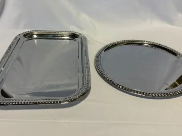 two different types of mirrors kept on a white background